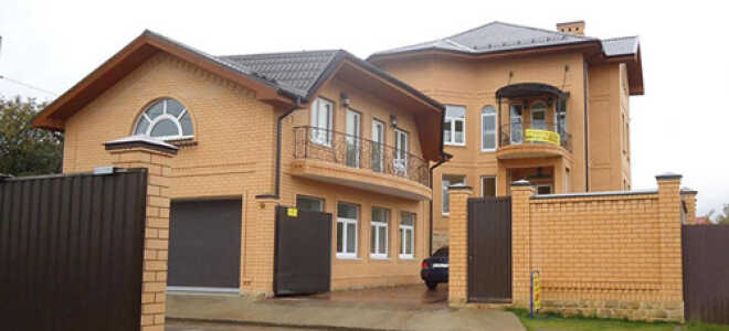 Типовой и индивидуальный проект кирпичного дома с гаражом